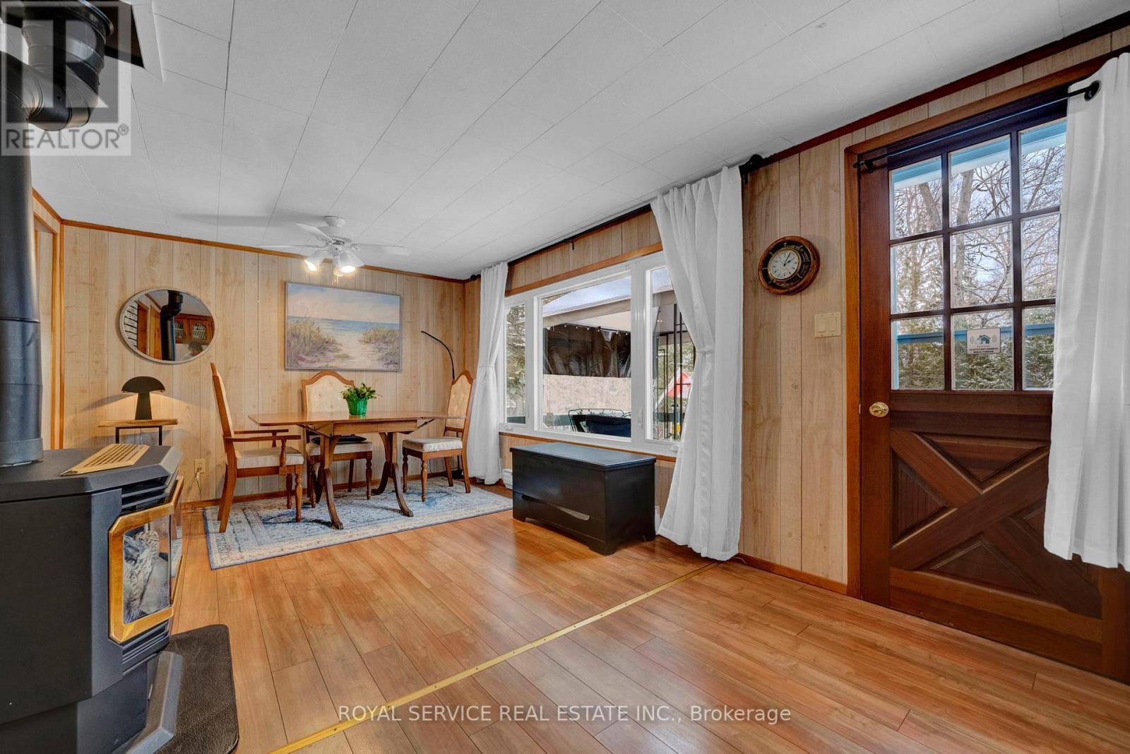 Walkout to Deck - 1039 Grace River Road, Highlands East (Monmouth), ON - Indoor Photo Showing Other Room