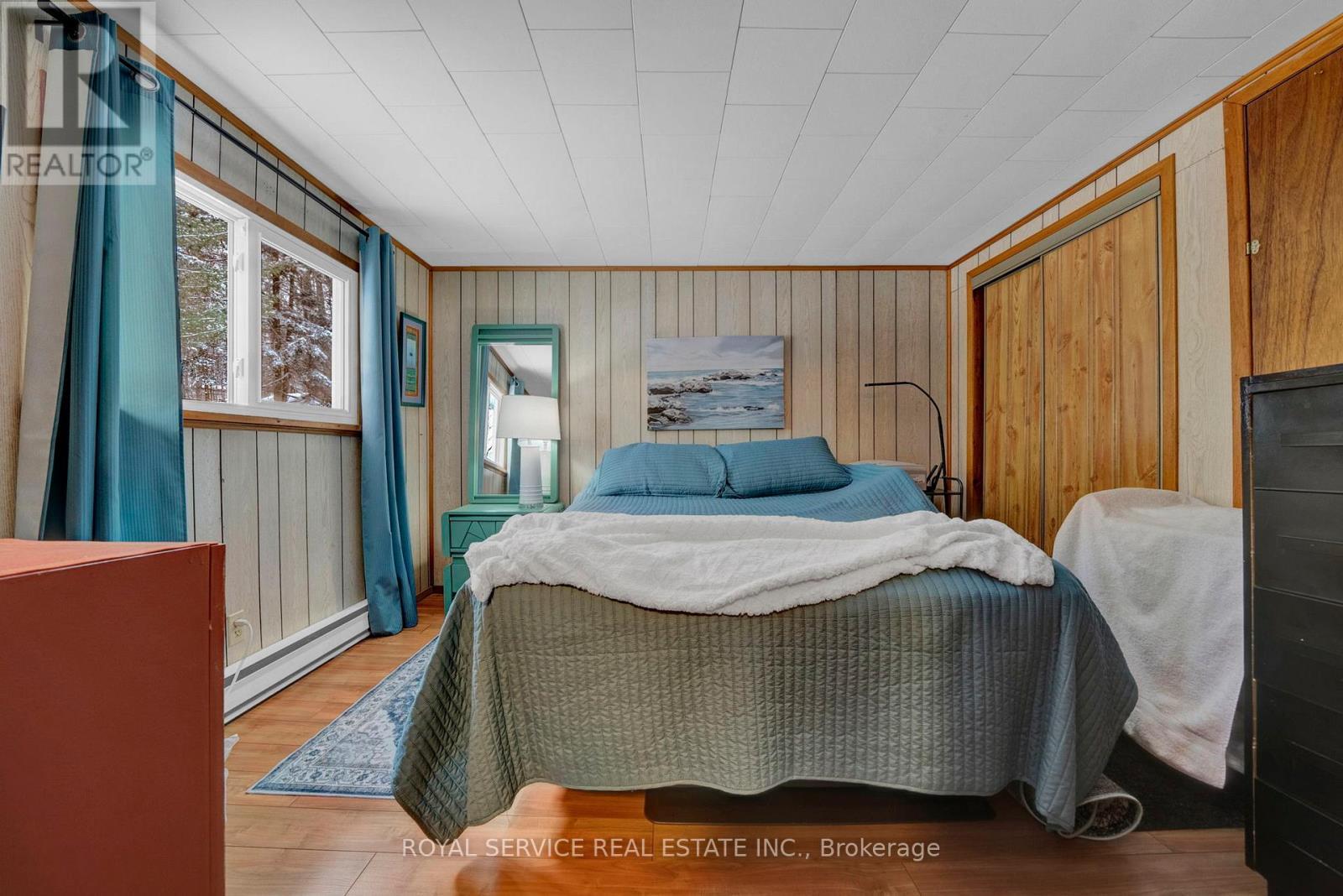 Primary Bedroom with 2 closets - 1039 Grace River Road, Highlands East (Monmouth), ON - Indoor Photo Showing Bedroom