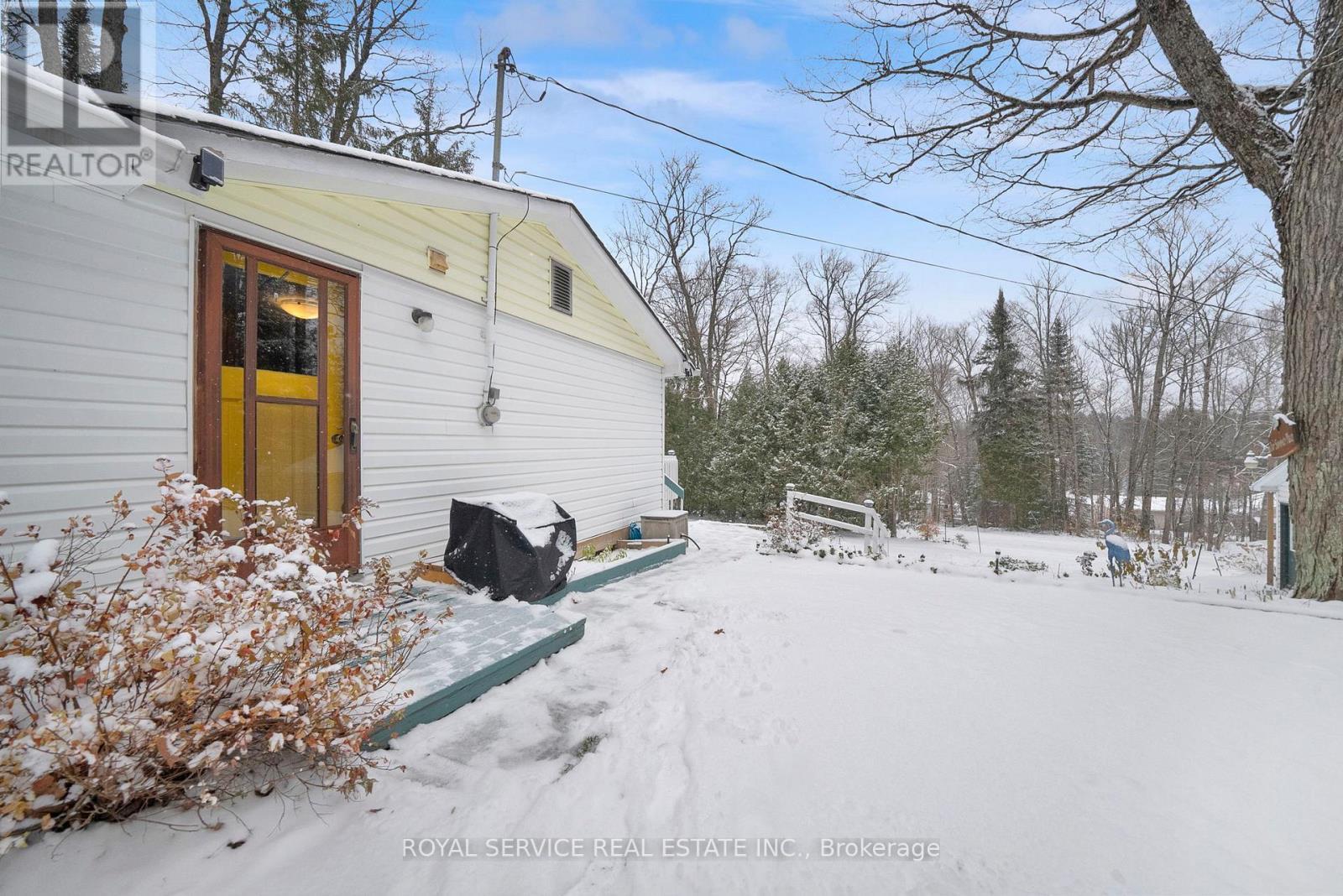 View of Side of House - 1039 Grace River Road, Highlands East (Monmouth), ON - Outdoor