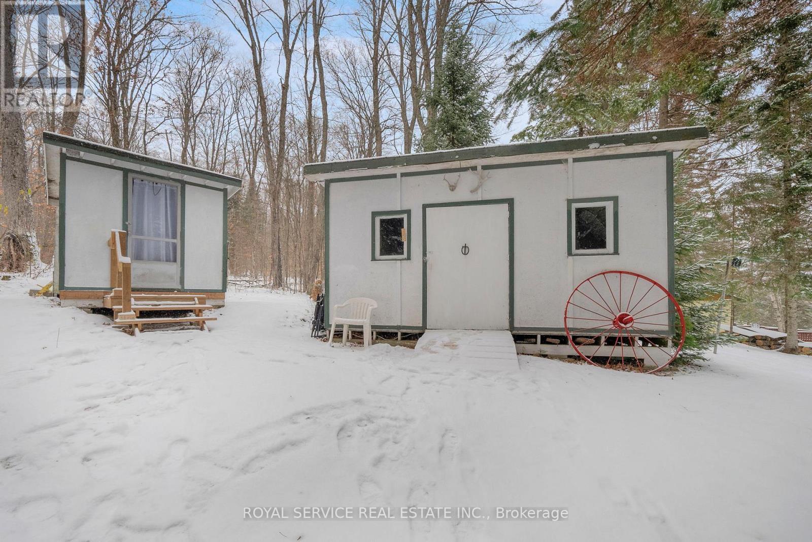 Bunkie and Storage Shed with Electricity - 1039 Grace River Road, Highlands East (Monmouth), ON - Outdoor