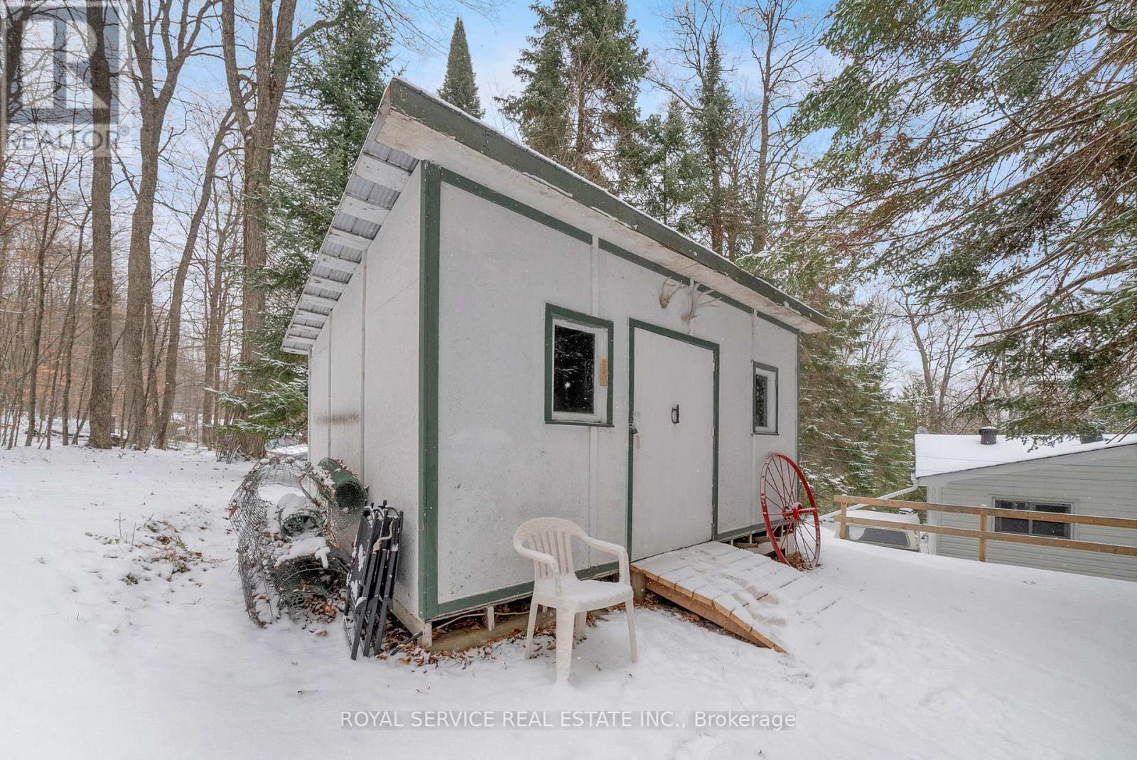 Storage Shed with Po - 1039 Grace River Road, Highlands East (Monmouth), ON - Outdoor