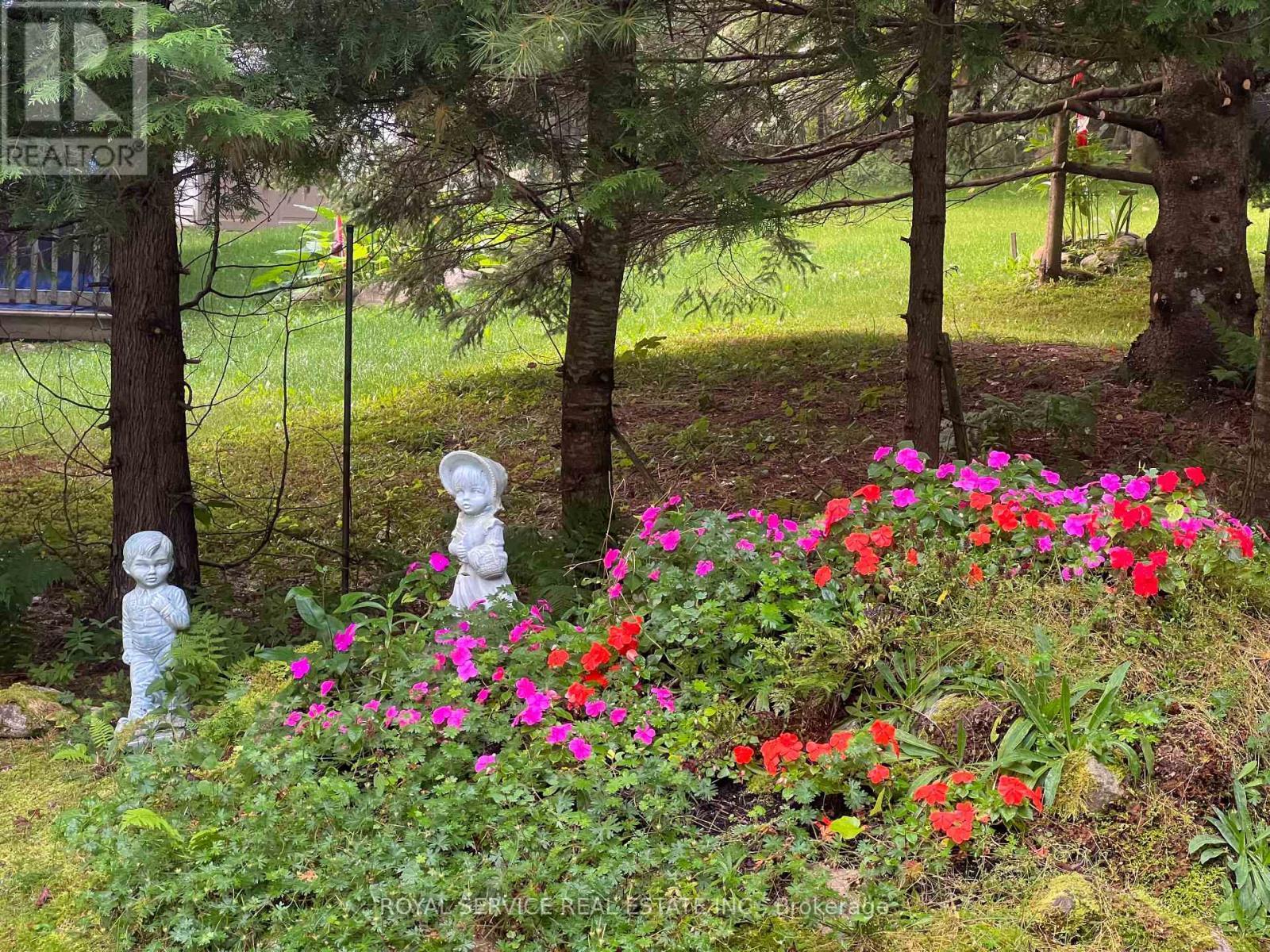 Sellers Summer Photo - 1039 Grace River Road, Highlands East (Monmouth), ON - Outdoor