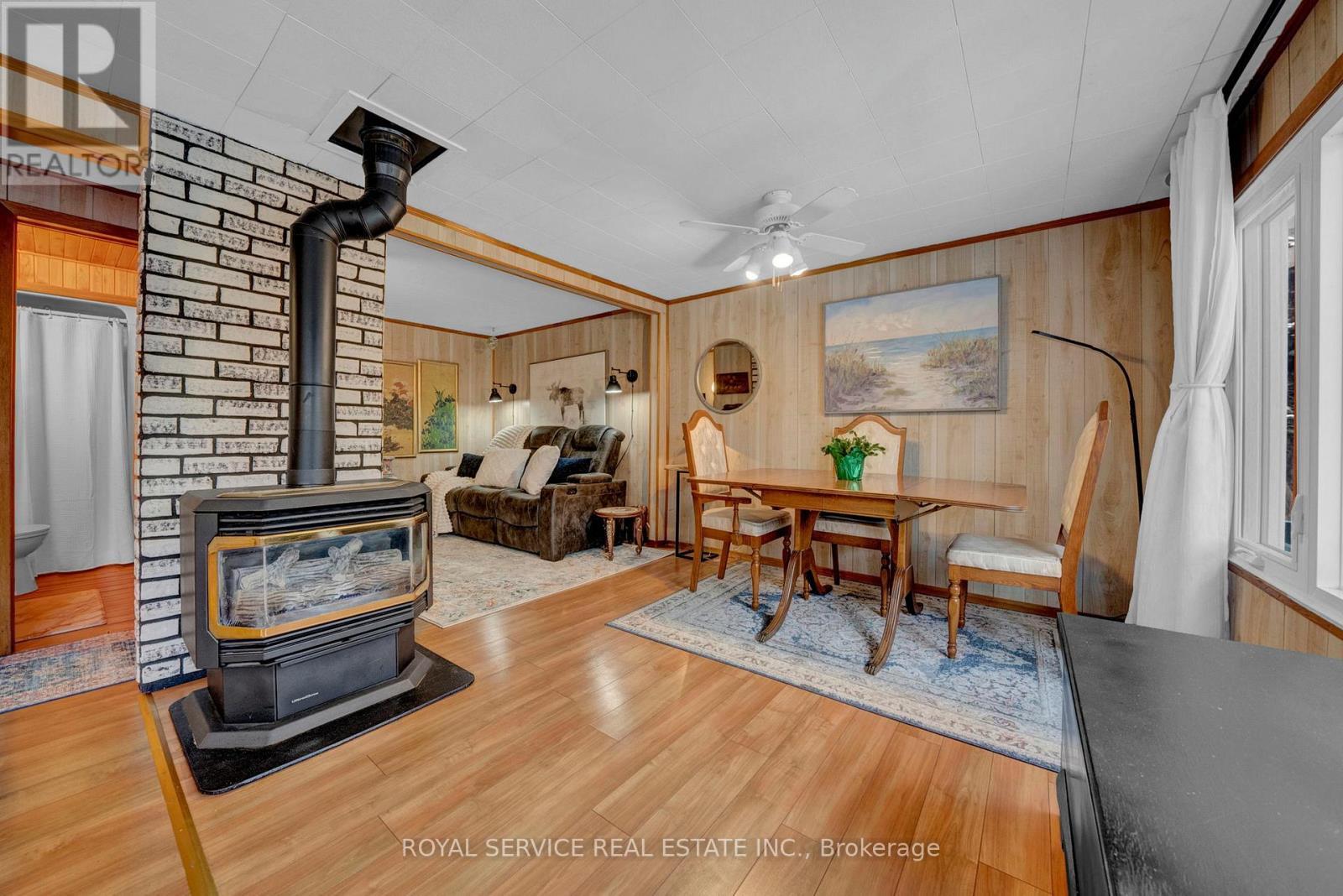 View of Open Concept Floor Plan - 1039 Grace River Road, Highlands East (Monmouth), ON - Indoor With Fireplace