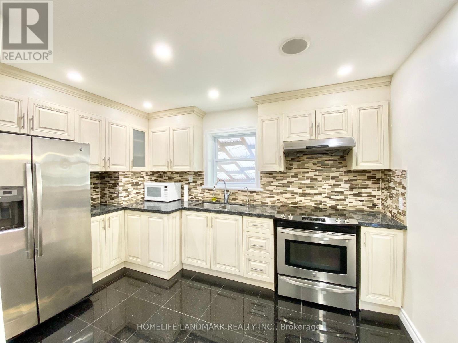 Main - 70 Shilton Road, Toronto, ON - Indoor Photo Showing Kitchen With Stainless Steel Kitchen With Double Sink