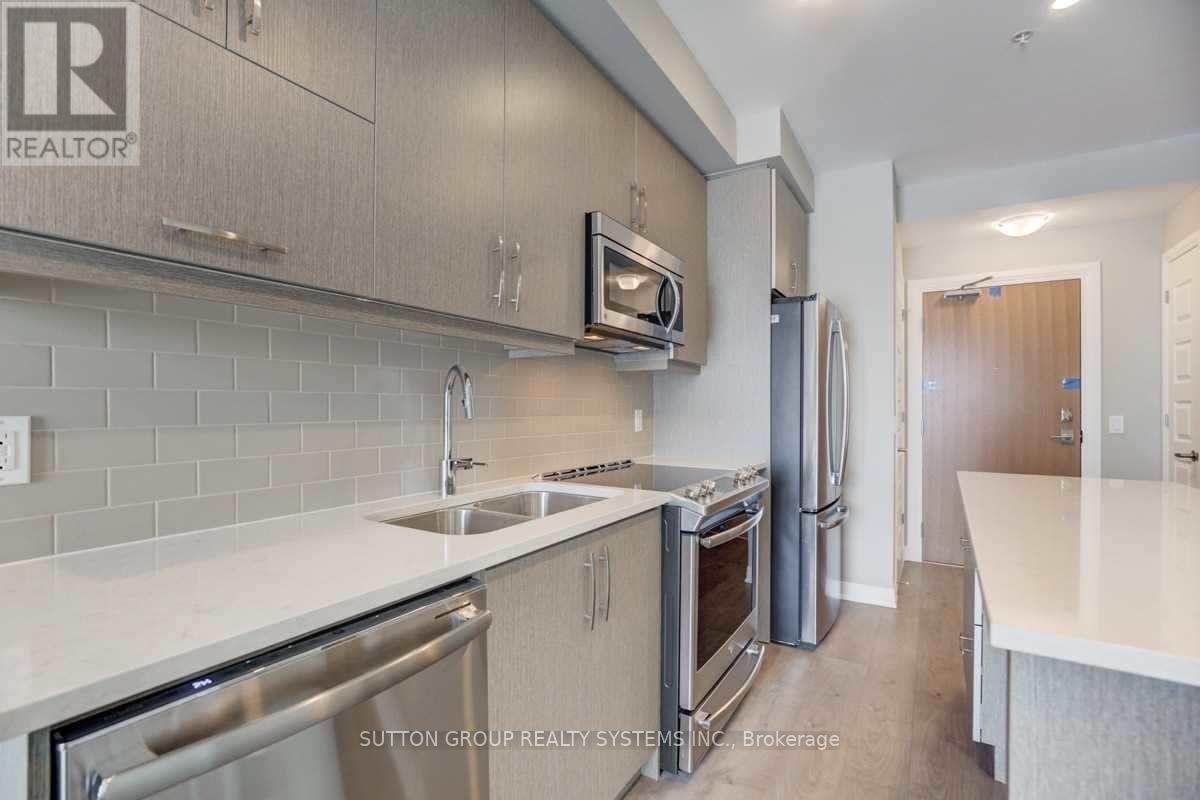 422 - 1105 Leger Way, Milton, ON - Indoor Photo Showing Kitchen With Stainless Steel Kitchen With Double Sink With Upgraded Kitchen