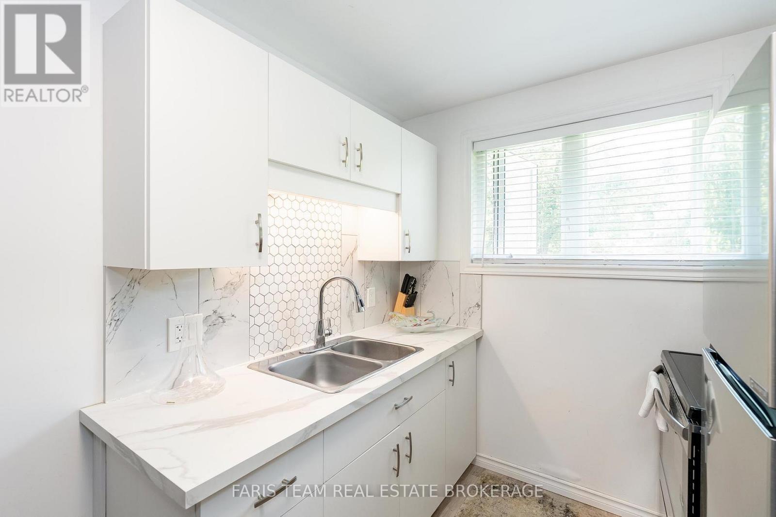 5880 Rama Dalton Boundary Road, Ramara, ON - Indoor Photo Showing Kitchen With Double Sink