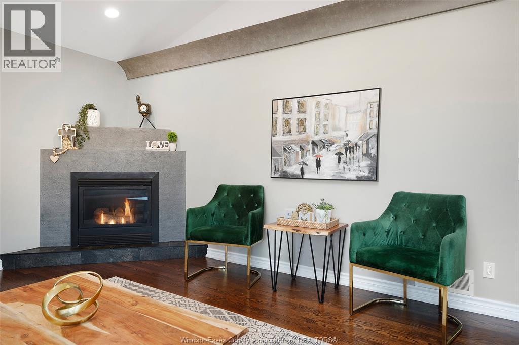 123 Pheasant Run, Lakeshore, ON - Indoor Photo Showing Living Room With Fireplace