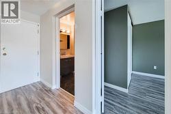 Unit features a textured ceiling and water resistant laminate faux wood finished floors -