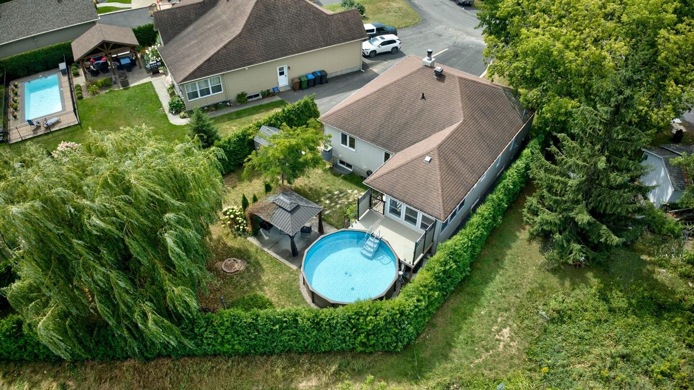Face arrière - 51 Rue Anatole-Touchette, Saint-Jean-Sur-Richelieu, QC - Outdoor With Above Ground Pool With View
