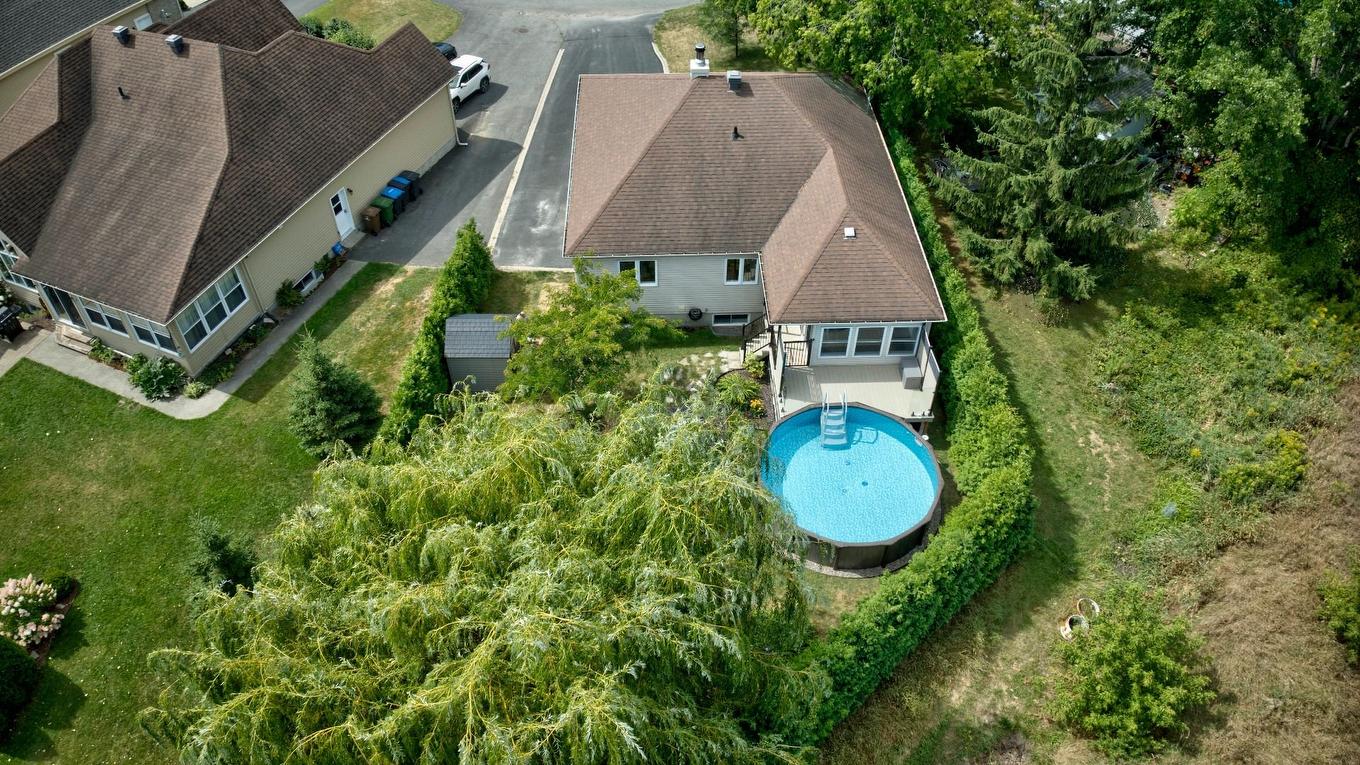 Face arrière - 51 Rue Anatole-Touchette, Saint-Jean-Sur-Richelieu, QC - Outdoor With Above Ground Pool With View