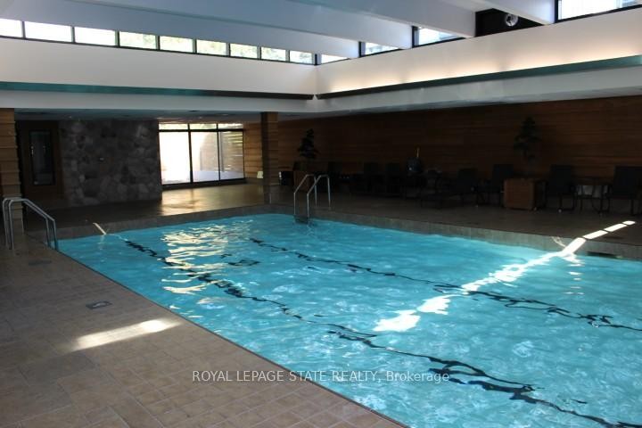 1507-150 Charlton Avenue E, Hamilton, ON - Indoor Photo Showing Other Room With In Ground Pool