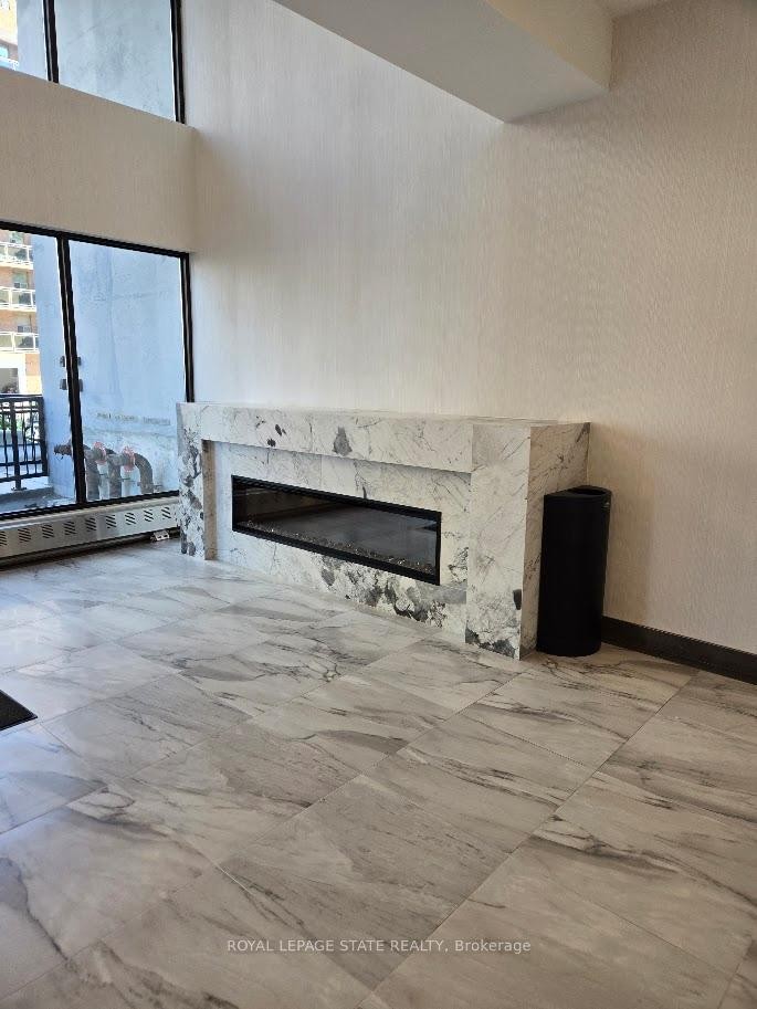 1507-150 Charlton Avenue E, Hamilton, ON - Indoor With Fireplace