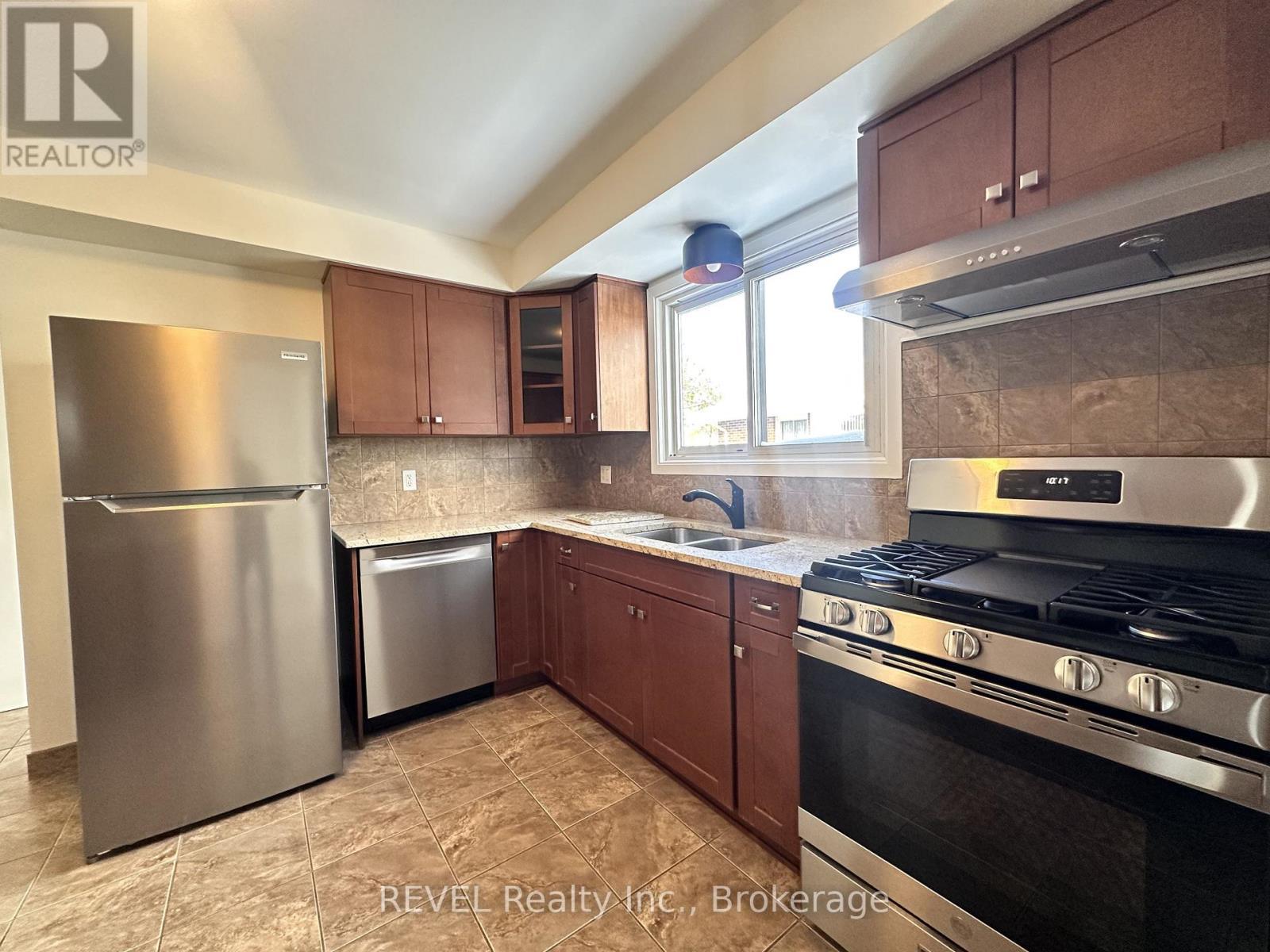 Upper - 7109 Jill Drive, Niagara Falls (Marineland), ON - Indoor Photo Showing Kitchen With Double Sink