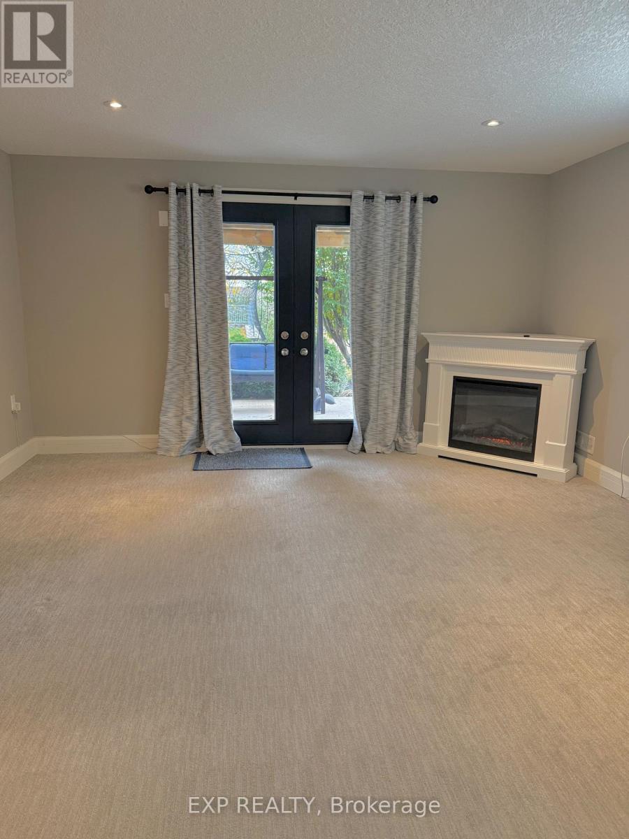 ORIGINAL INTERIOR - 353 Colborne Street, Centre Wellington, ON - Indoor Photo Showing Other Room With Fireplace