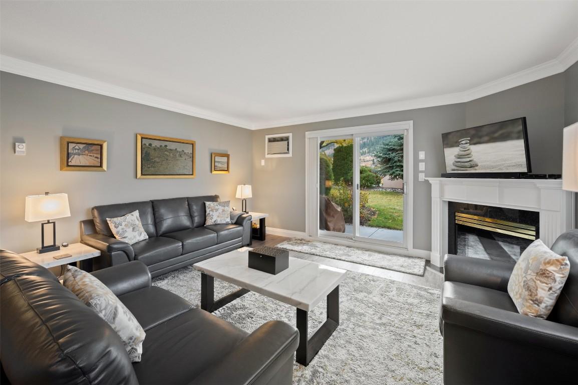 109-8700 Jubilee Road, Summerland, BC - Indoor Photo Showing Living Room With Fireplace