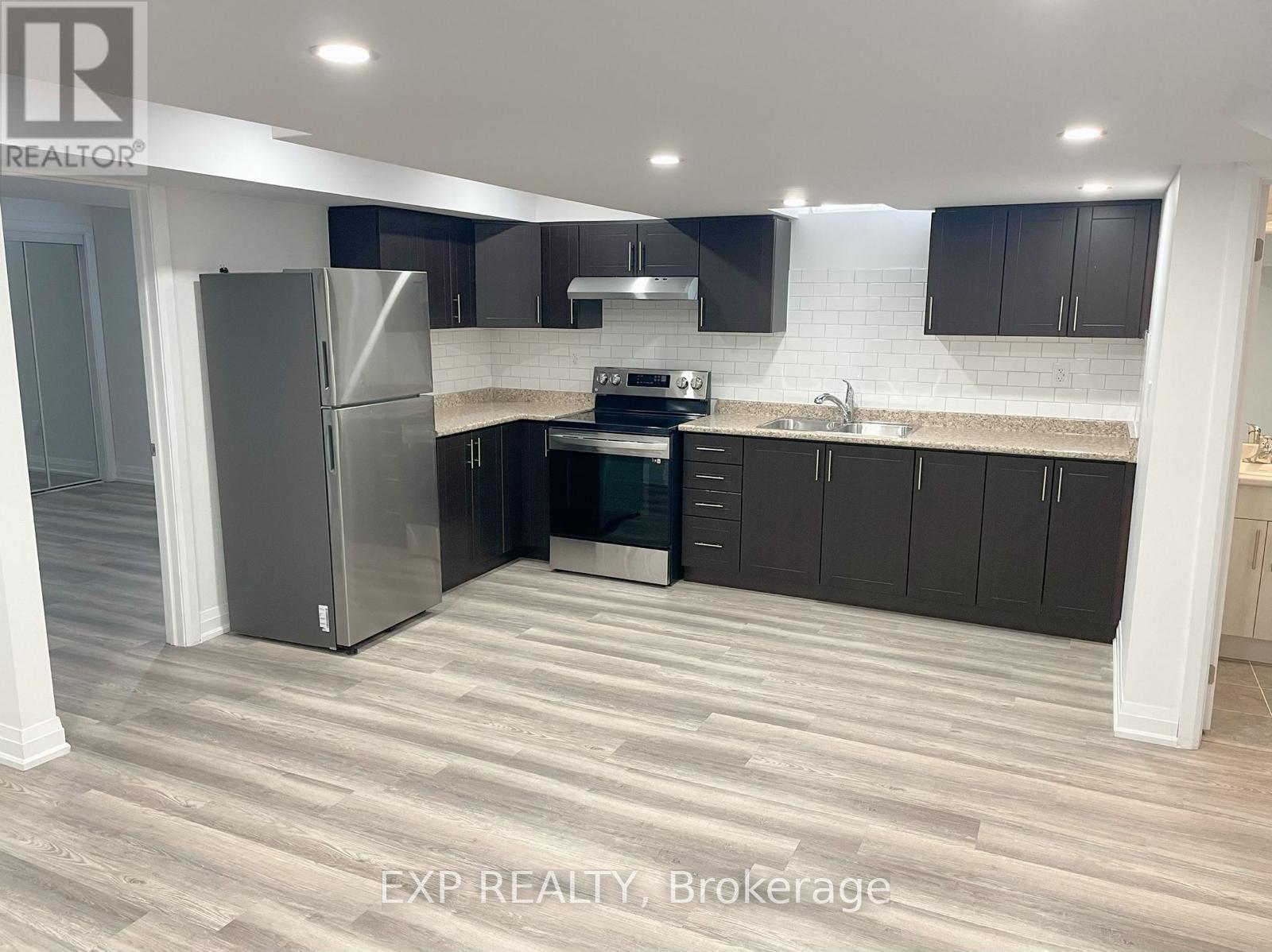 79 Elmhurst Street, Scugog, ON - Indoor Photo Showing Kitchen With Double Sink