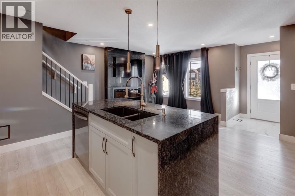 2238 Windbury Greenway Sw, Airdrie, AB - Indoor Photo Showing Kitchen With Double Sink