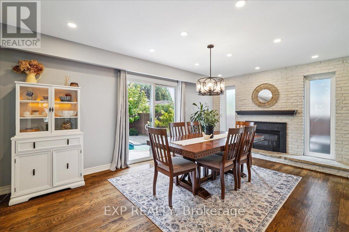 1923 Steepbank Crescent, Mississauga, ON - Indoor Photo Showing Dining Room With Fireplace