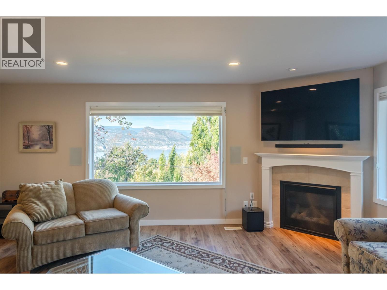 2864 Arawana Road, Naramata, BC - Indoor Photo Showing Living Room With Fireplace