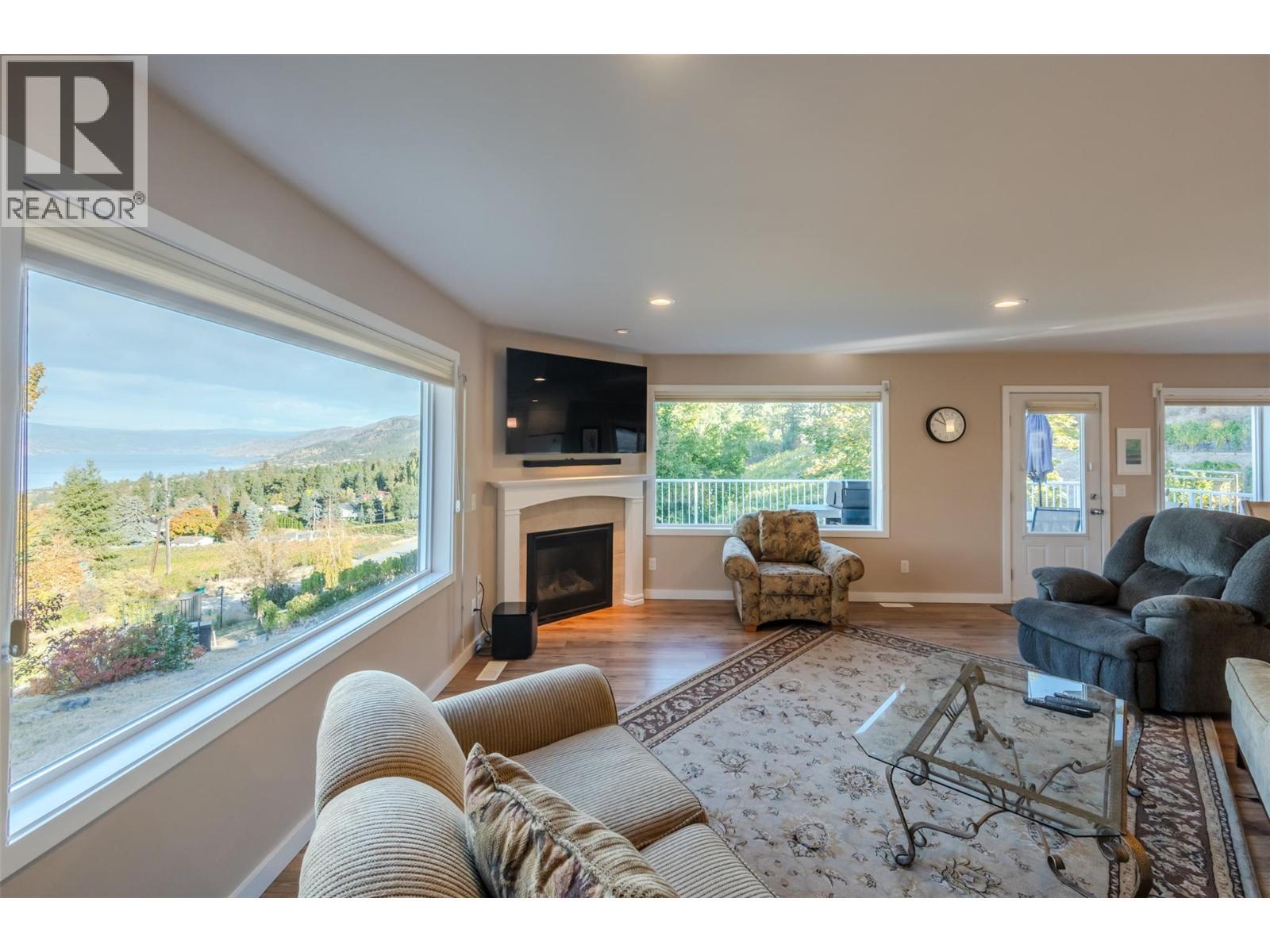 2864 Arawana Road, Naramata, BC - Indoor Photo Showing Living Room With Fireplace