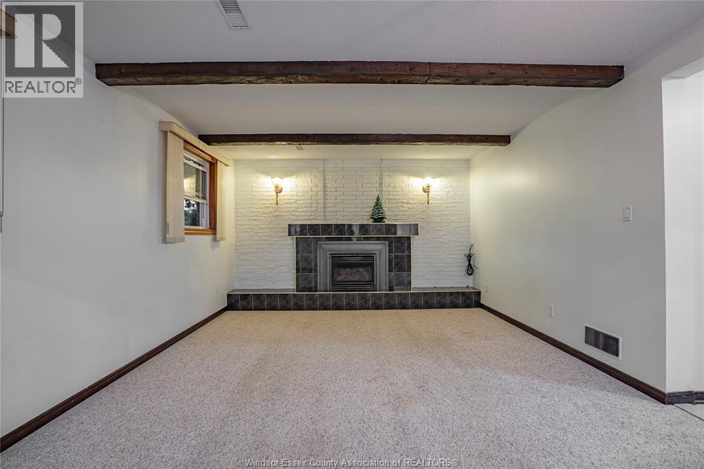 9610 Asgard Road, Windsor, ON - Indoor With Fireplace