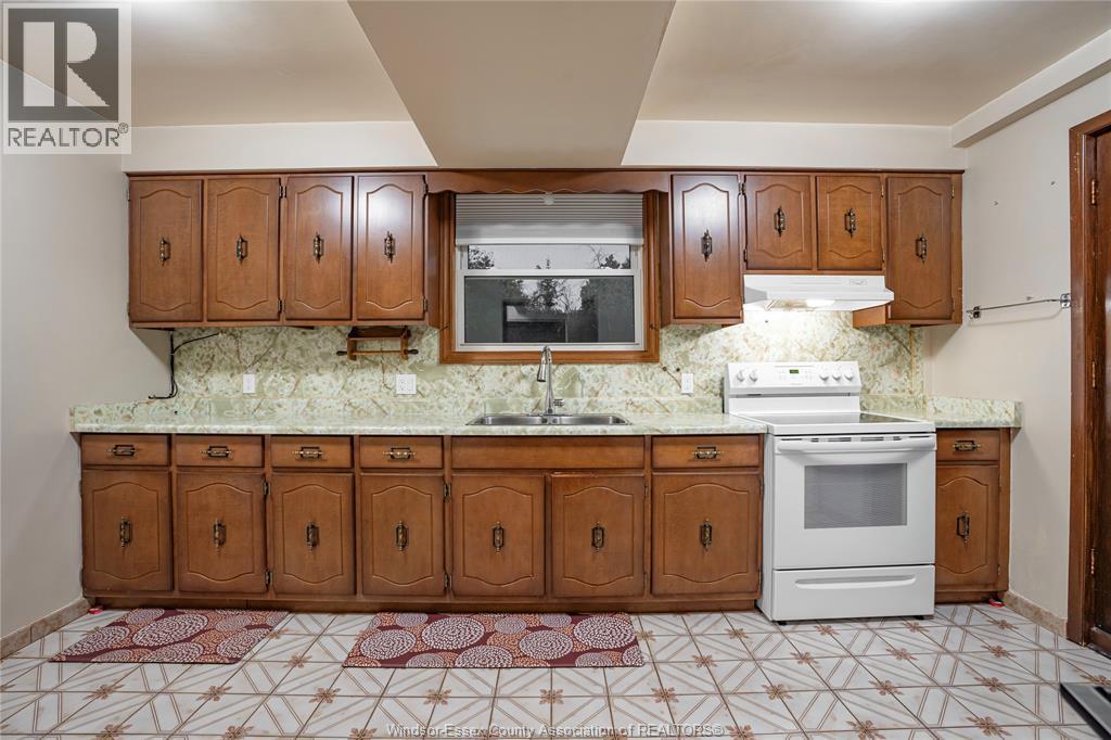9610 Asgard Road, Windsor, ON - Indoor Photo Showing Kitchen With Double Sink