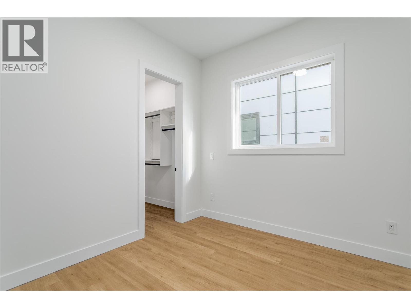 In Law Suite Bedroom - 1148 Hume Avenue, Kelowna, BC - Indoor Photo Showing Other Room