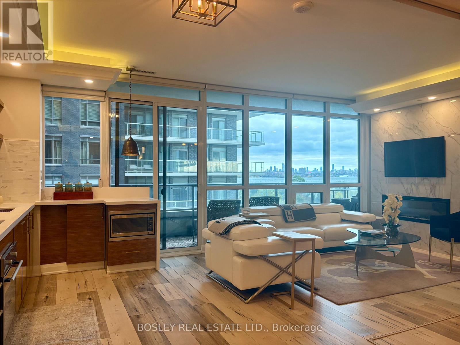 302 - 59 Annie Craig Drive, Toronto, ON - Indoor With Fireplace