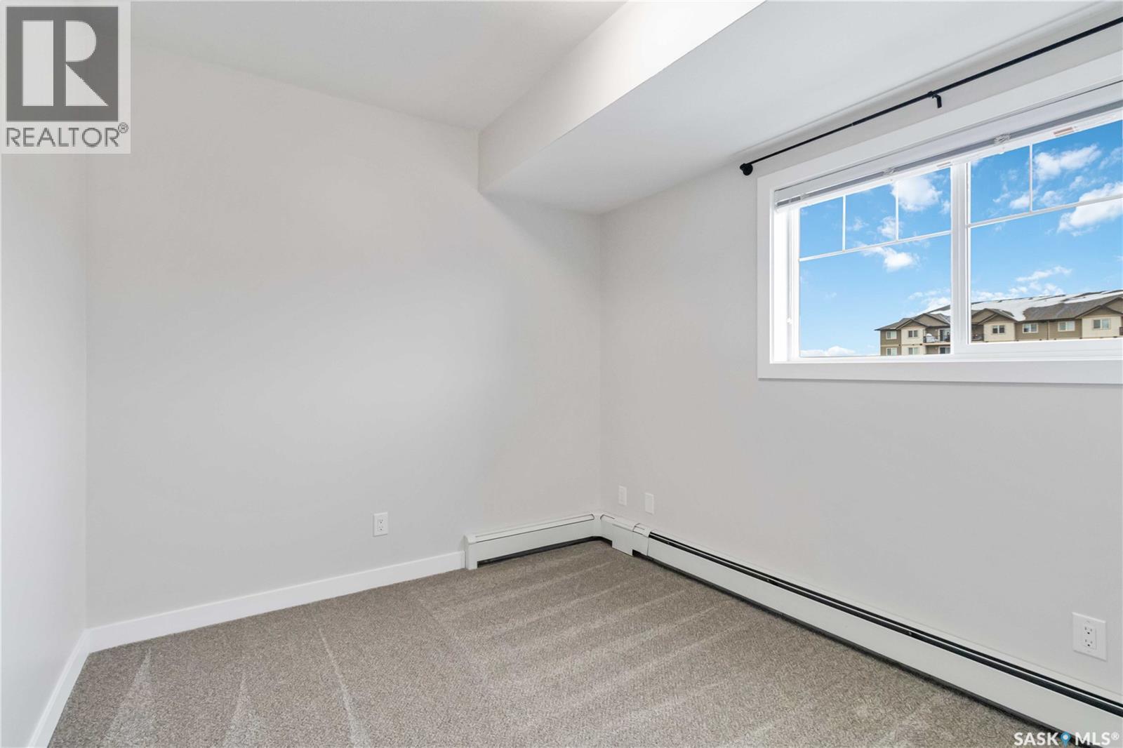 209 710 Hart Road, Saskatoon, SK - Indoor Photo Showing Other Room