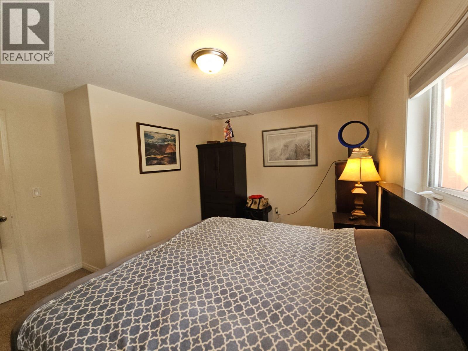 84 Wolverine Avenue, Tumbler Ridge, BC - Indoor Photo Showing Bedroom