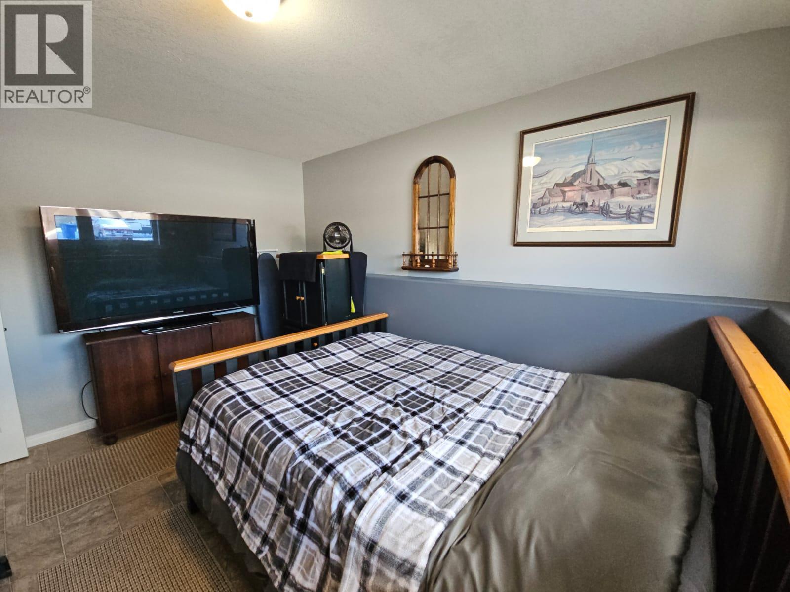 84 Wolverine Avenue, Tumbler Ridge, BC - Indoor Photo Showing Bedroom