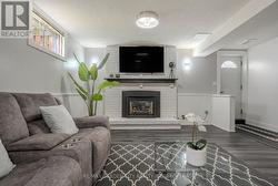 Rec Room with Gas Fireplace in Basement -