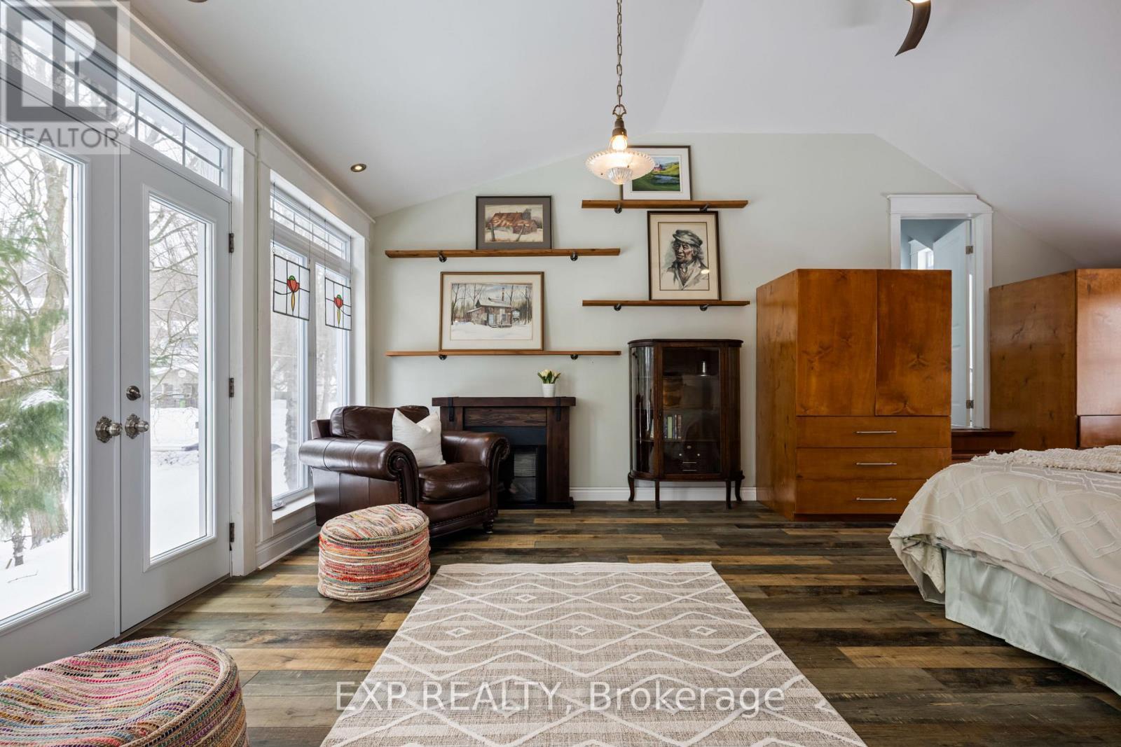 Primary Bedroom - 16 Mill Street, Amaranth, ON - Indoor With Fireplace