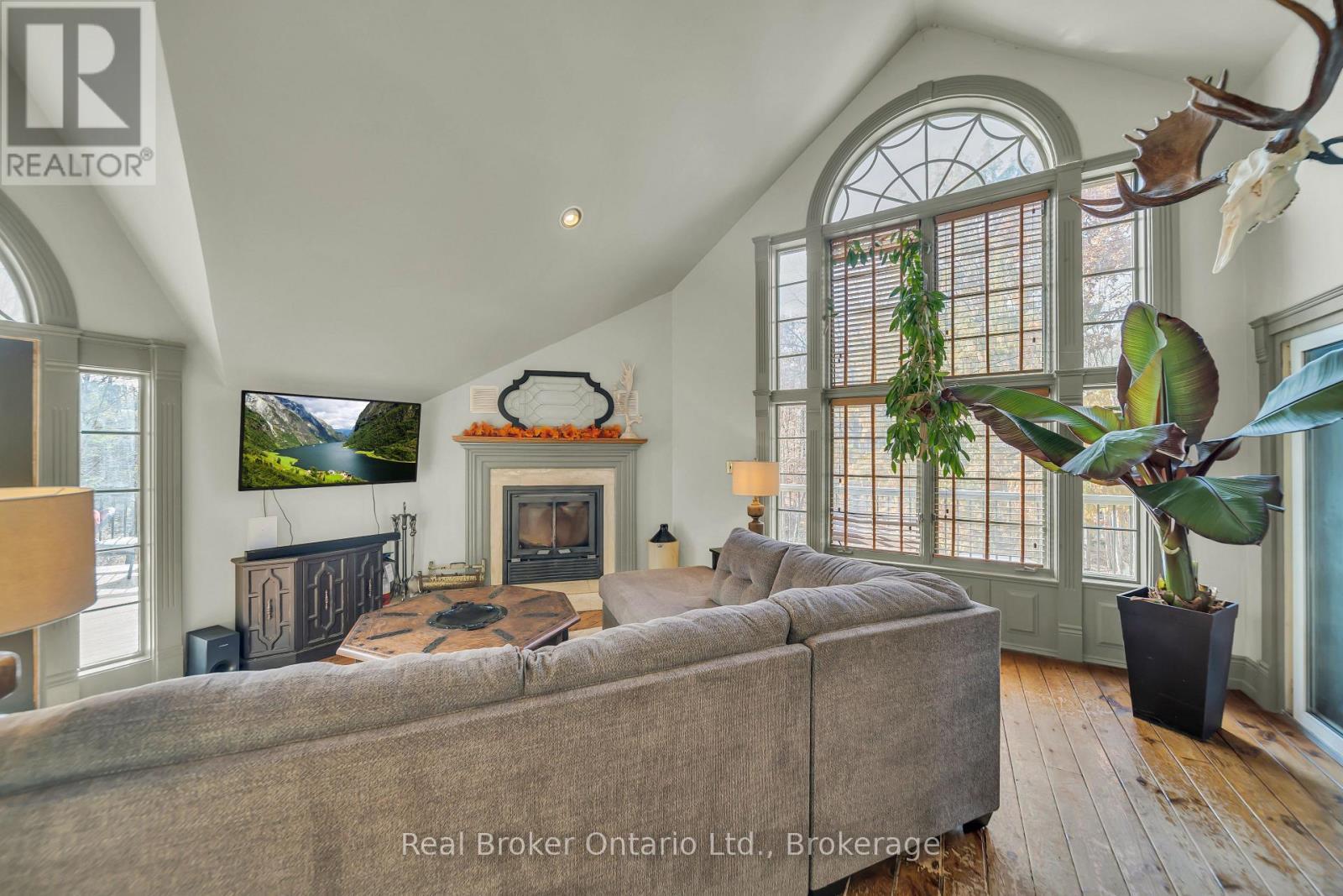 4766 Hyndman Drive, Southwest Middlesex, ON - Indoor With Fireplace
