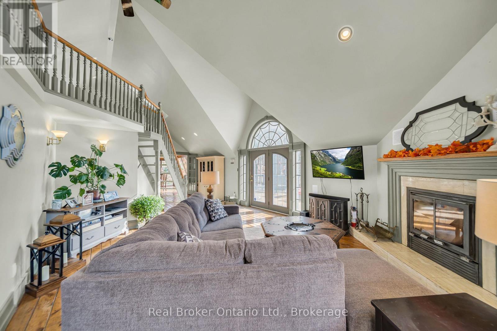 4766 Hyndman Drive, Southwest Middlesex, ON - Indoor With Fireplace