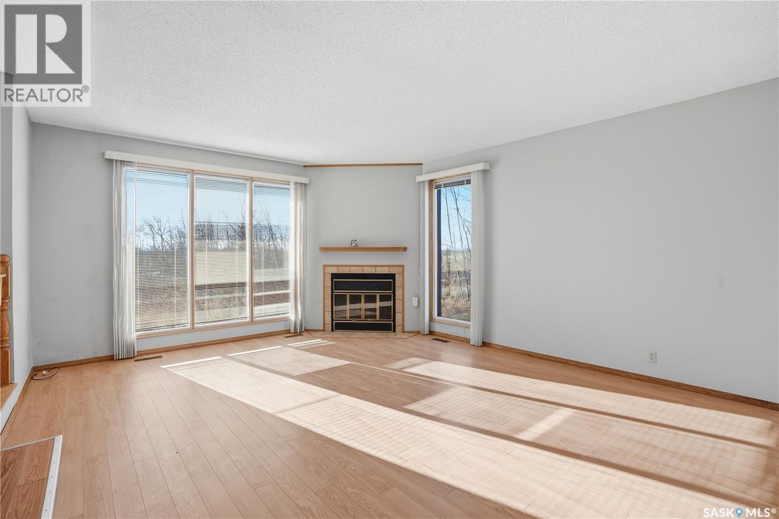 Kasahoff Acreage, Corman Park Rm No. 344, SK - Indoor Photo Showing Living Room With Fireplace