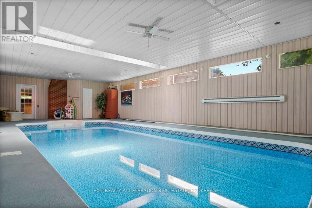 63 River Road, Greater Napanee (Greater Napanee), ON - Indoor Photo Showing Other Room With In Ground Pool