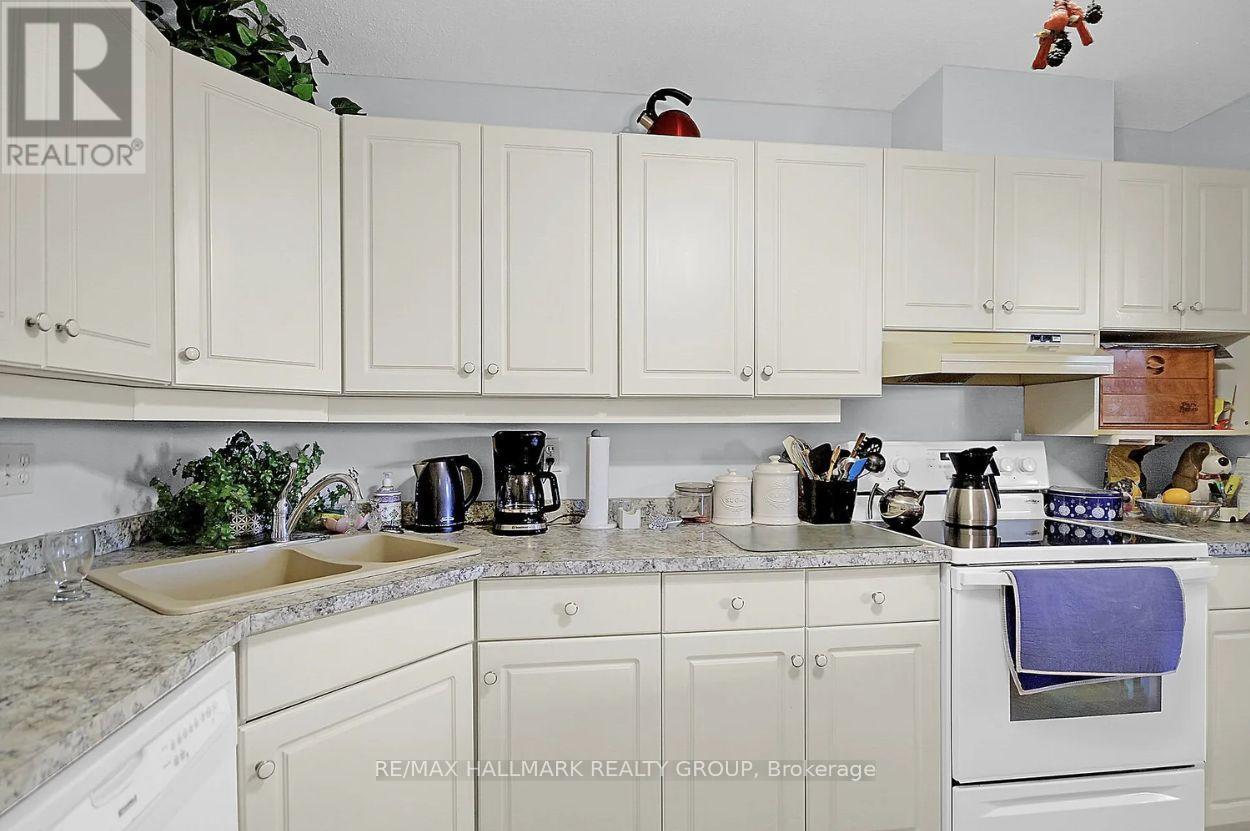 104 - 206 Woodward Street, Carleton Place, ON - Indoor Photo Showing Kitchen With Double Sink