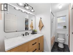 Beautifully updated main floor 4 piece bathroom can serve as ensuite and guest bath. -