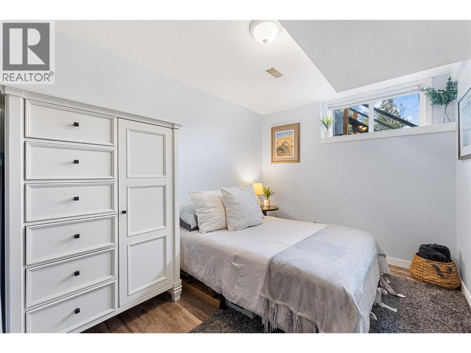 Fourth bedroom downstairs. - 3380 Mciver Road, West Kelowna, BC - Indoor Photo Showing Bedroom
