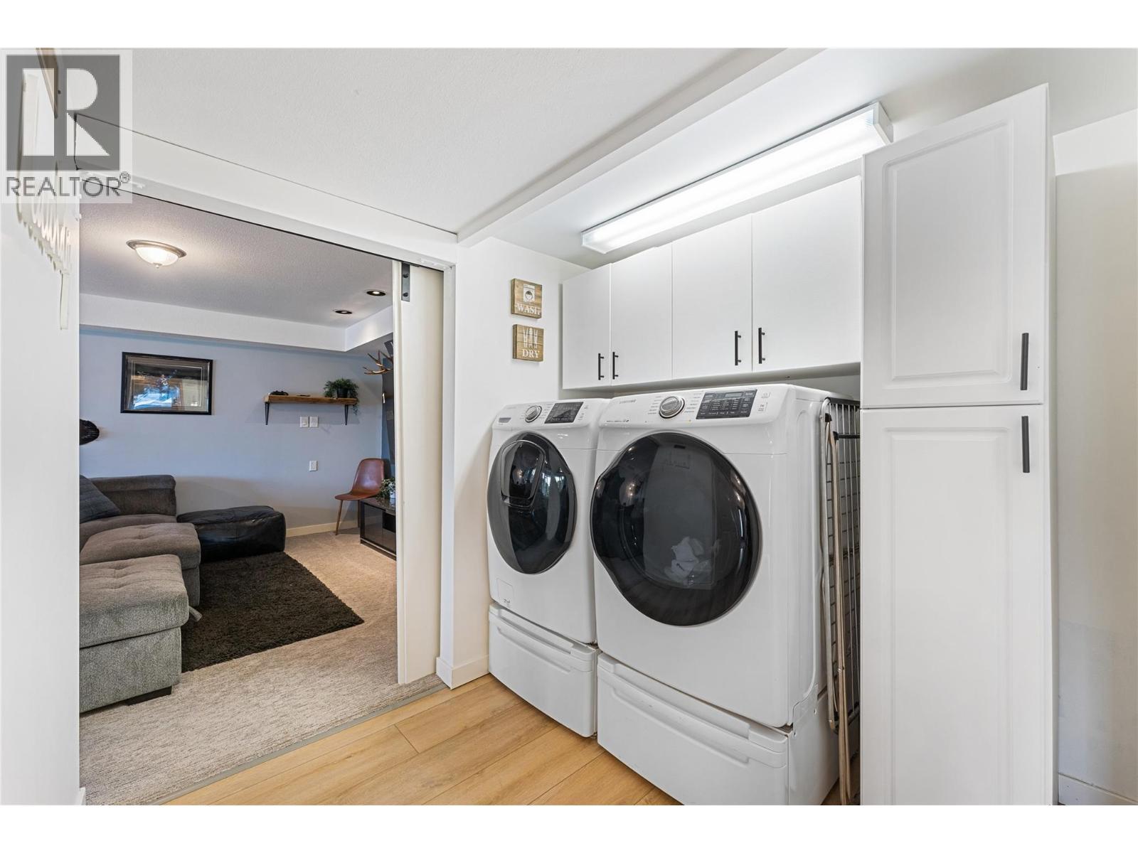 Lots of room to do laundry here. - 3380 Mciver Road, West Kelowna, BC - Indoor Photo Showing Laundry Room