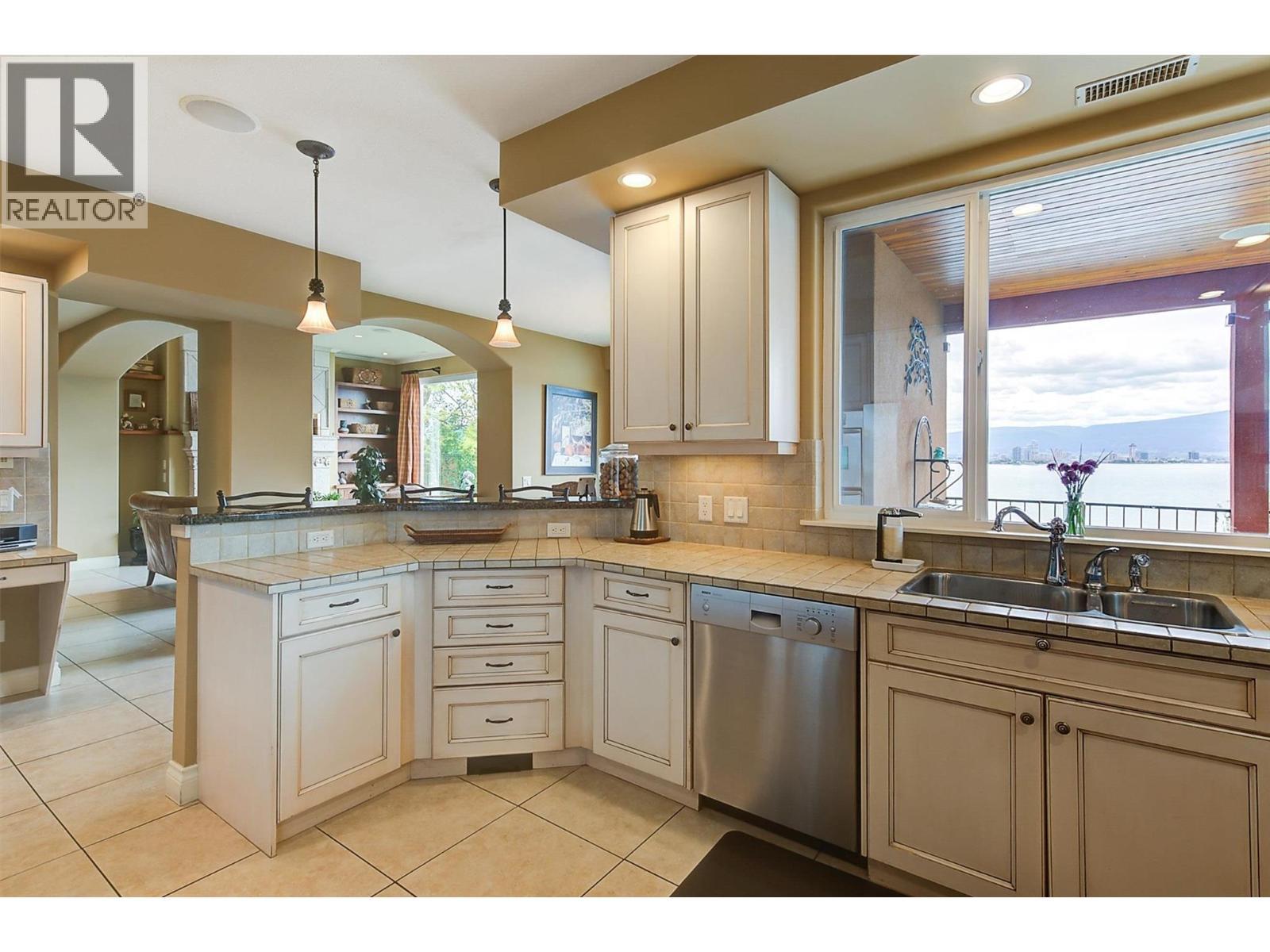 683 Westside Road S, West Kelowna, BC - Indoor Photo Showing Kitchen With Double Sink