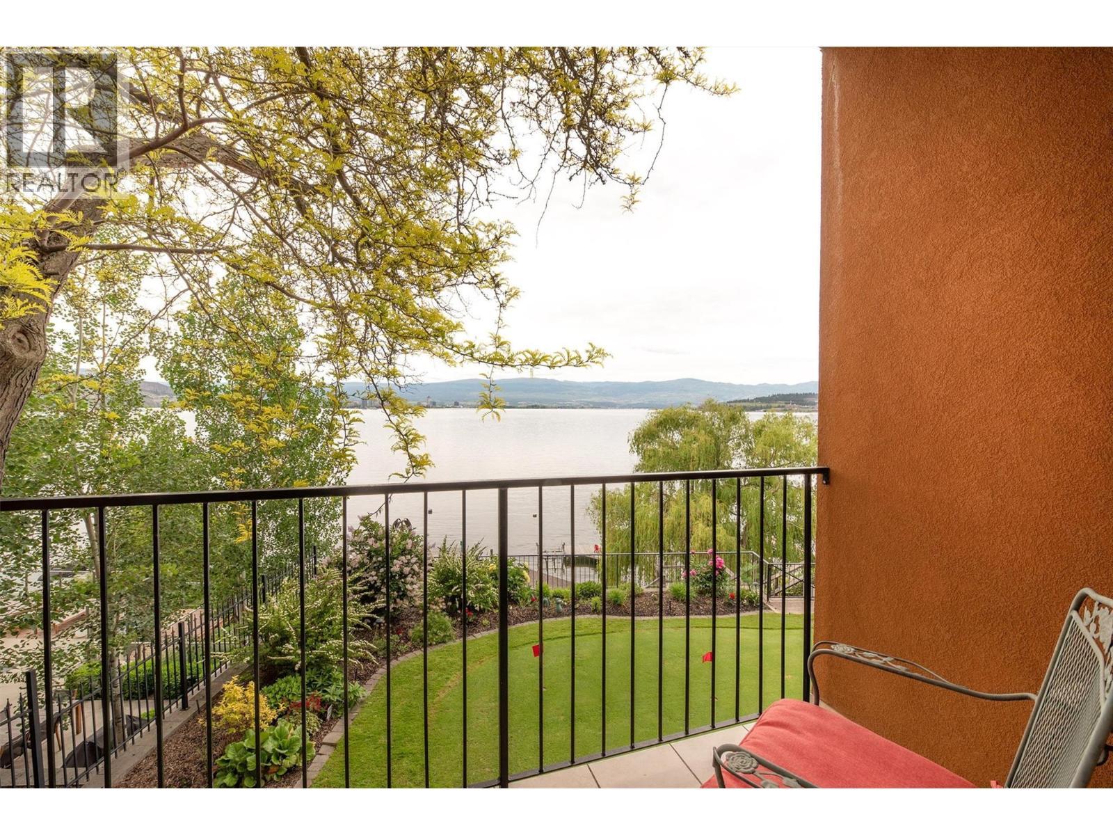 main level bedroom 2 private patio - 683 Westside Road S, West Kelowna, BC - Outdoor With View