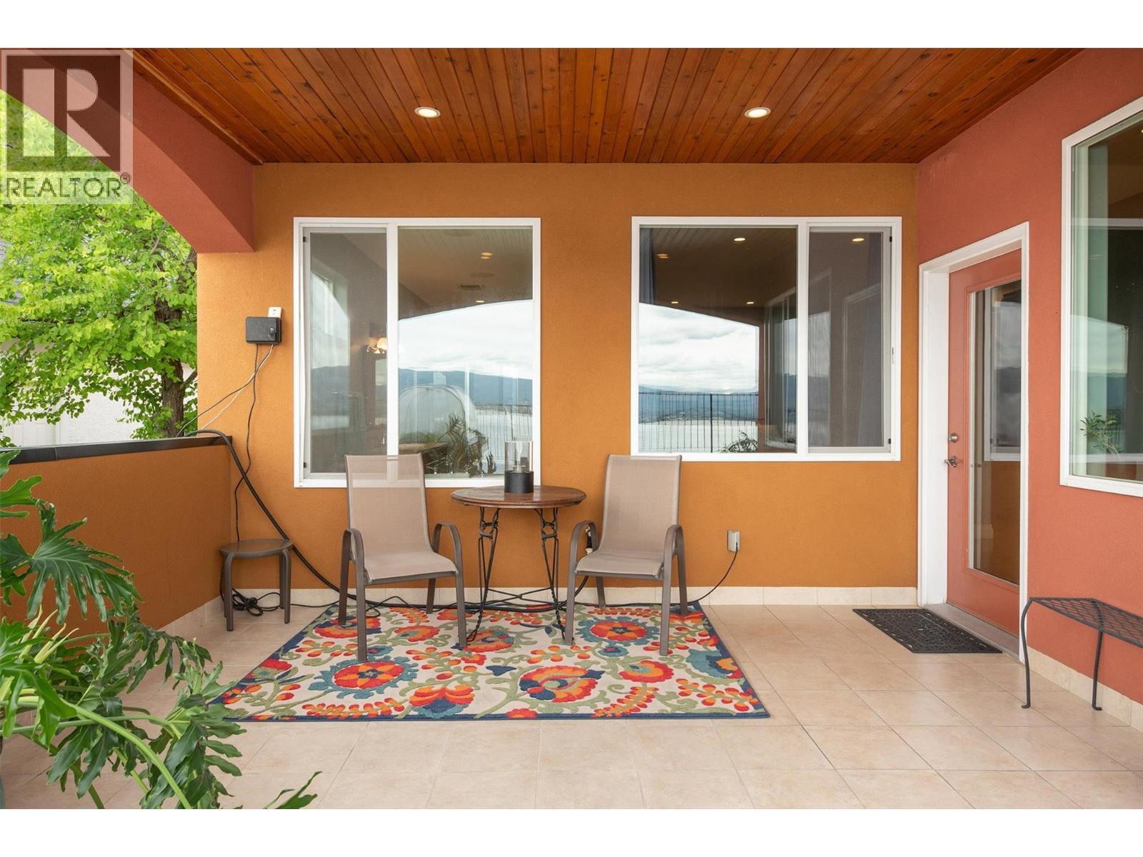 private patio from primary bedroom - 683 Westside Road S, West Kelowna, BC - Outdoor With Exterior