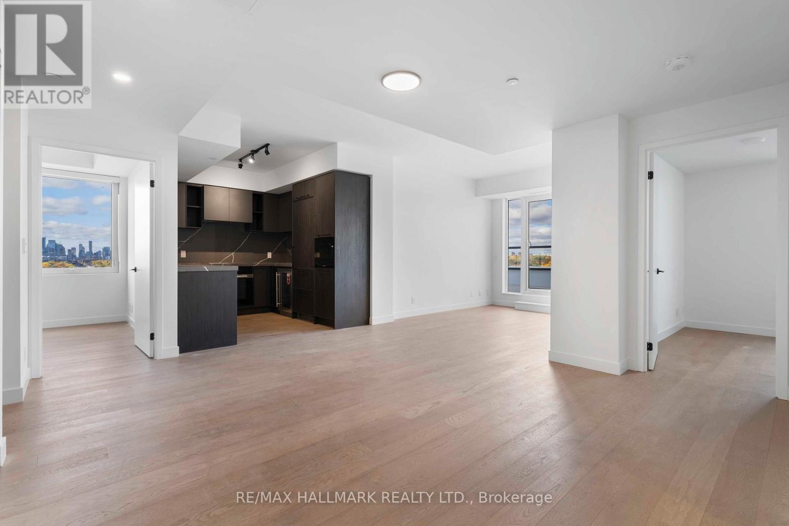 From foyer into the apt - 1310 - 1050 Eastern Avenue, Toronto, ON - Indoor Photo Showing Kitchen