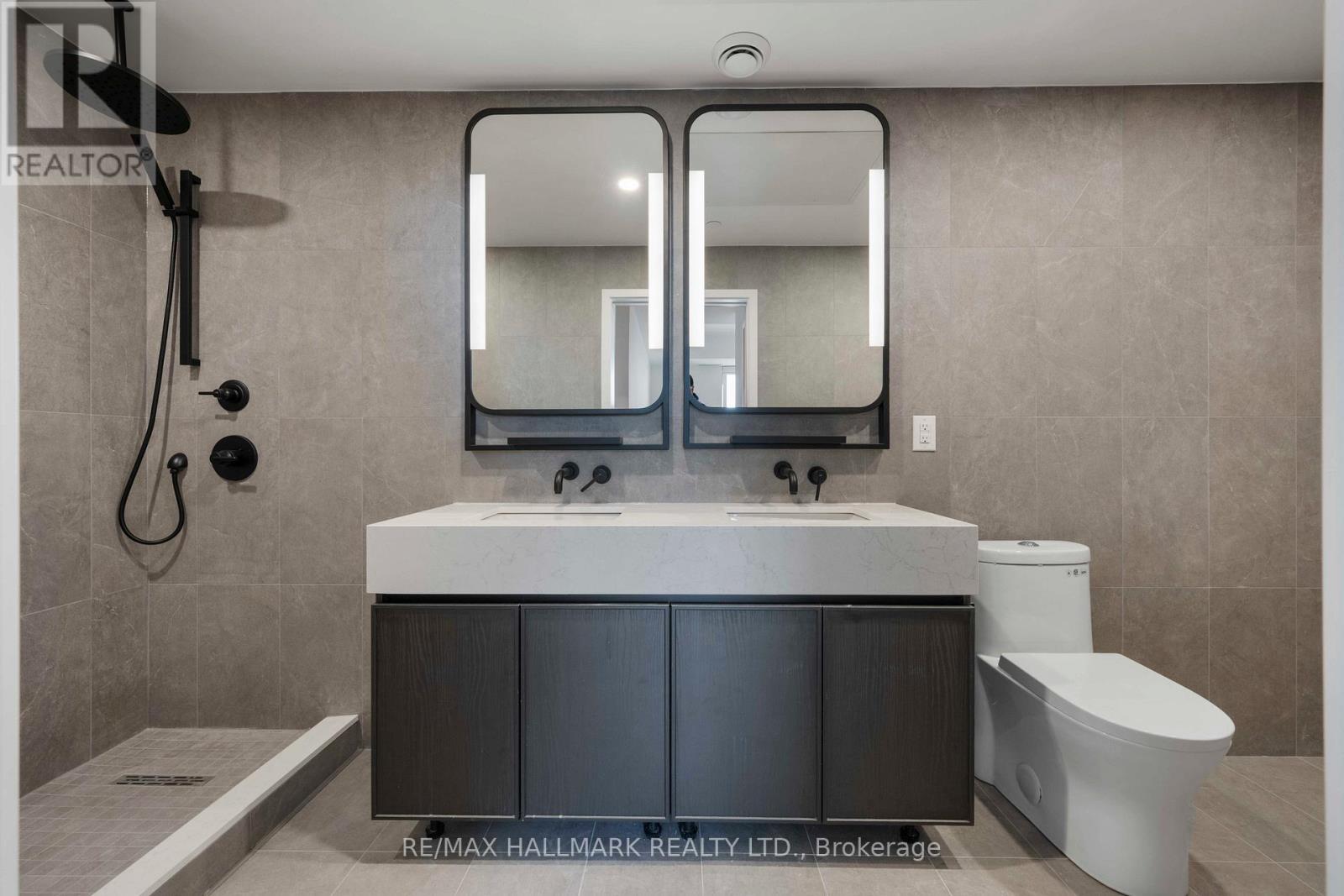 Double vanity in primary - 1310 - 1050 Eastern Avenue, Toronto, ON - Indoor Photo Showing Bathroom