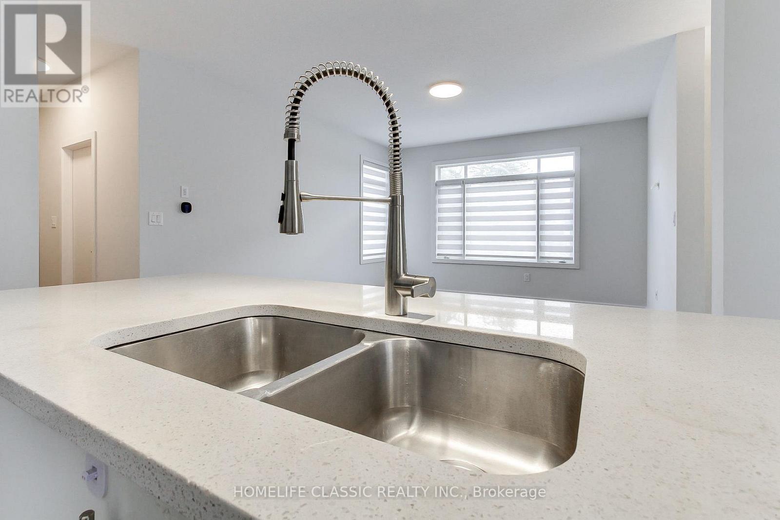 #1 - 590 North Service Road, Hamilton, ON - Indoor Photo Showing Kitchen With Double Sink