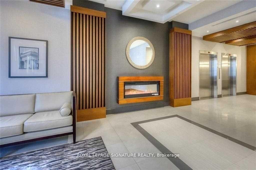 1110-150 Main Street W, Hamilton, ON - Indoor Photo Showing Living Room With Fireplace