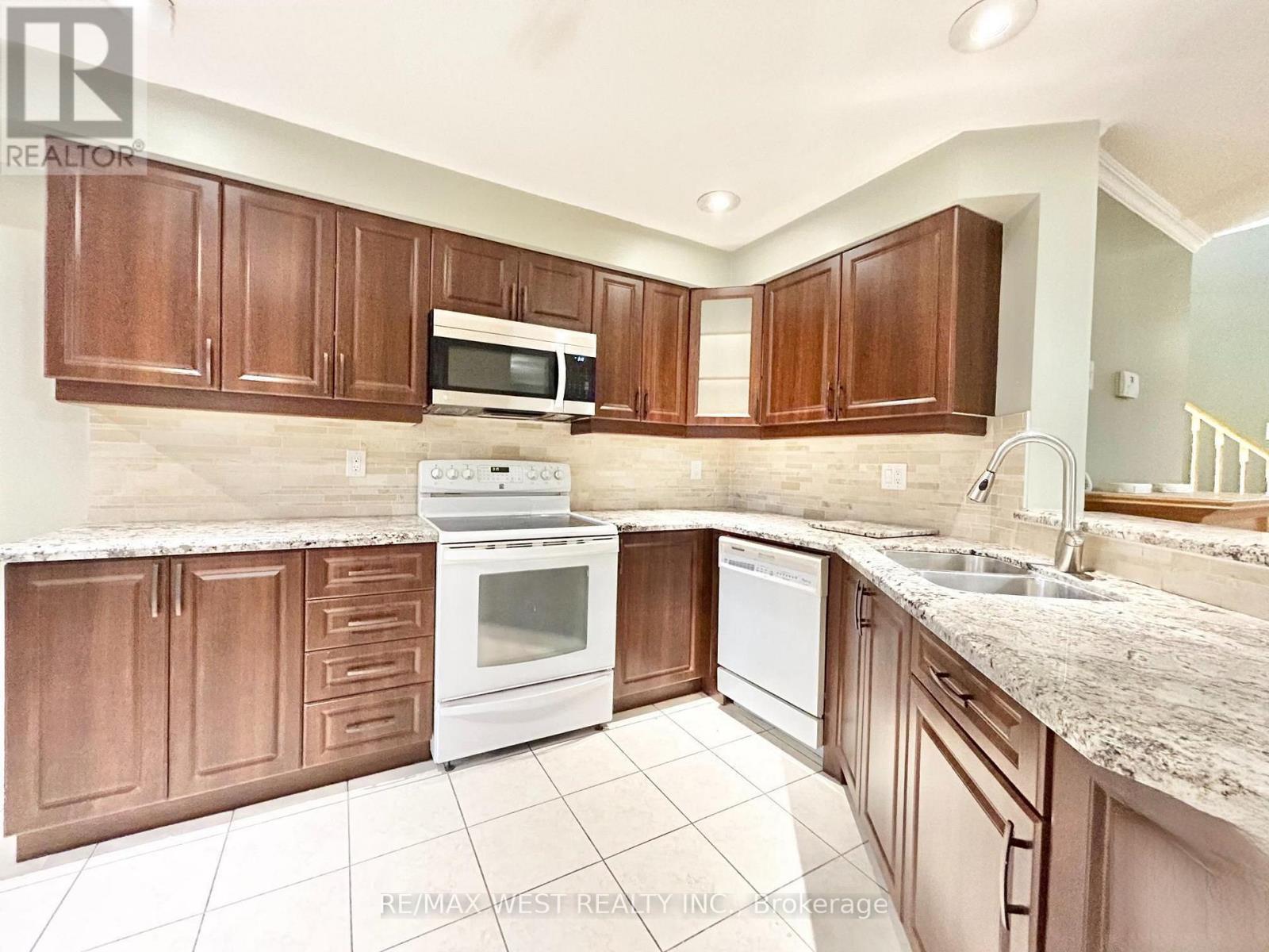 1 - 66 Manley Lane, Milton, ON - Indoor Photo Showing Kitchen With Double Sink