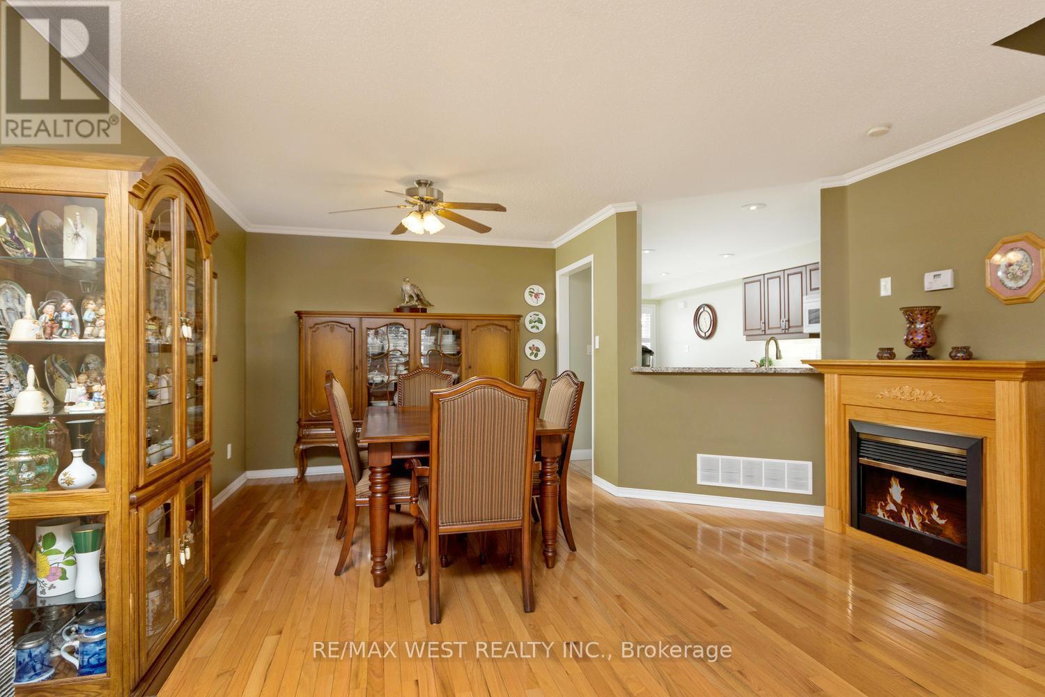 1 - 66 Manley Lane, Milton, ON - Indoor With Fireplace